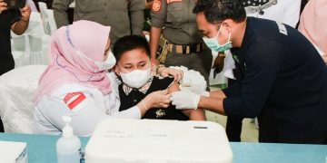 Ultah ke 9, Abeng Putra Bungsu Bupati Kasmarni Beranikan Diri Ikut Vaksinasi Masal Presisi di Duri