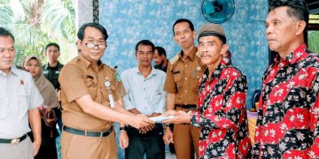 Bupati Bengkalis Serahkan 750 Sertifikat Redistribusi Tanah