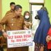 Diserahkan Camat Riki, Ratusan KK di Desa Bathin Betuah dan Harapan Baru Terima Bantuan BLT-DD