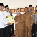 Bupati Kasmarni Serahkan 134 SK Kepada Penyuluh Agama Islam