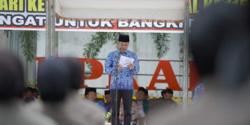Pimpin Upacara Harkitnas, Bupati Rohil Sampaikan Amanat Menteri Kominfo